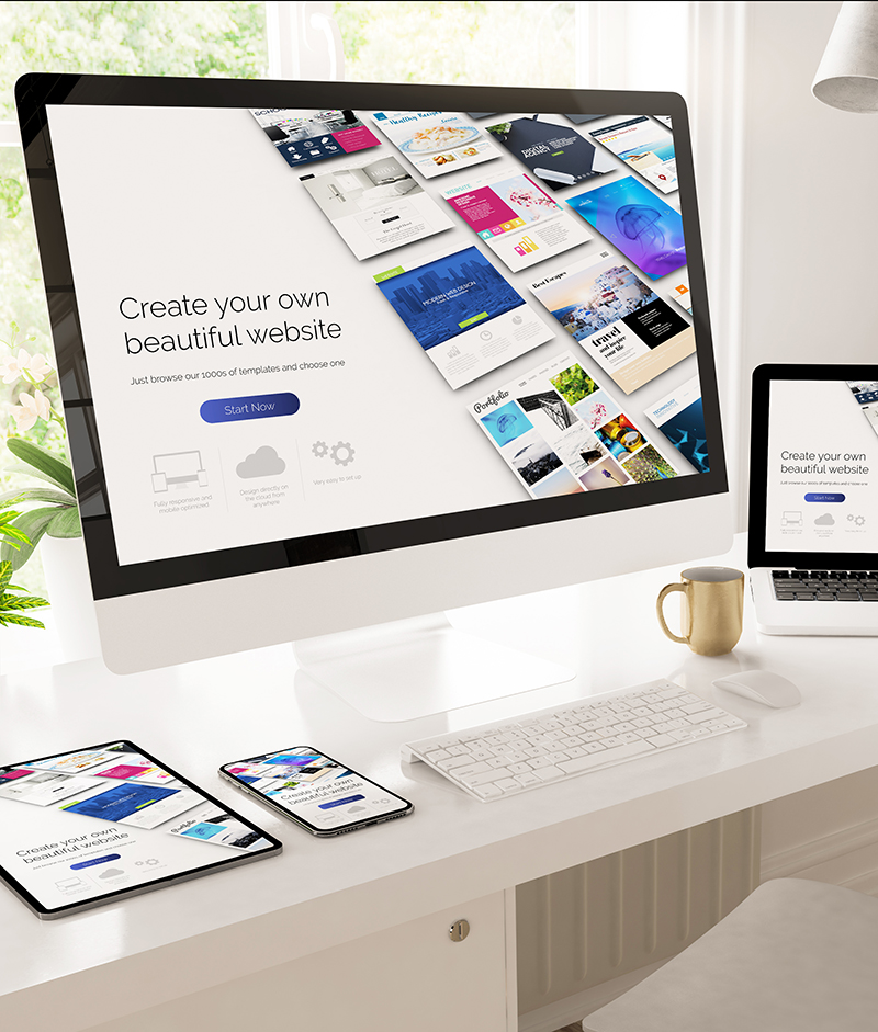 responsive devices on home office setup showing website builder
